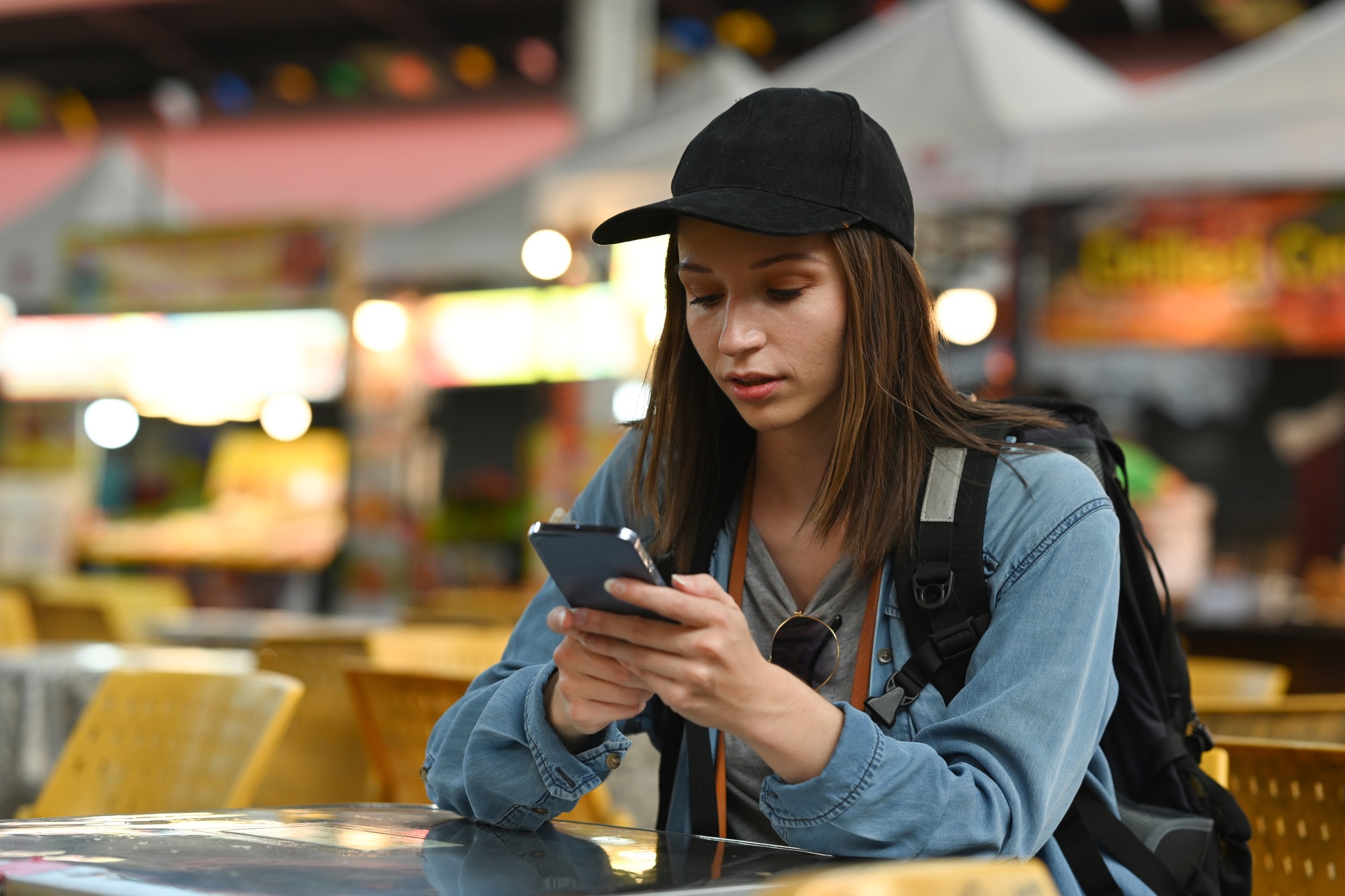 Beautiful caucasian young woman messaging on smart phone