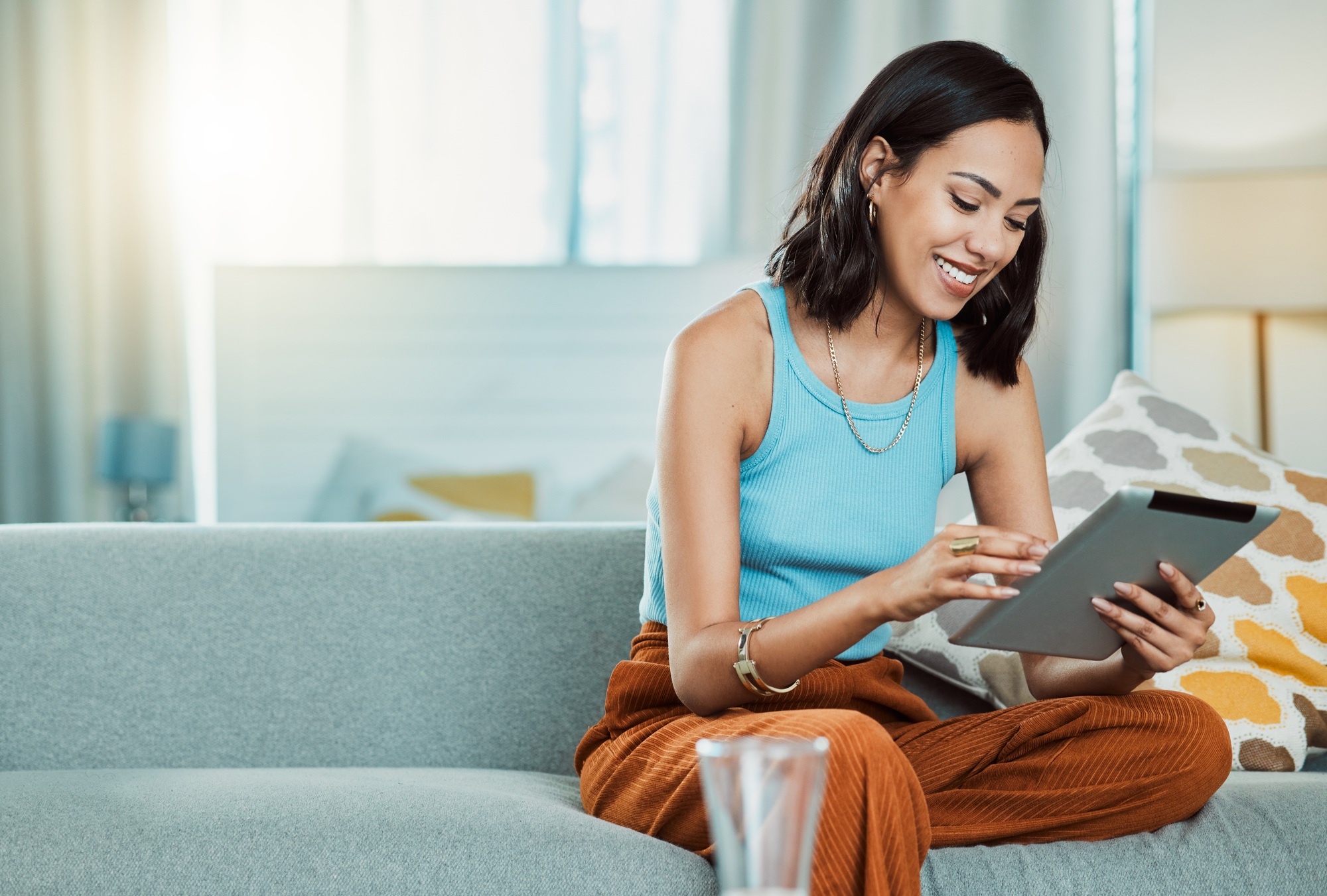 Streaming movies to watch online on digital tablet, watching videos and scrolling on social media w